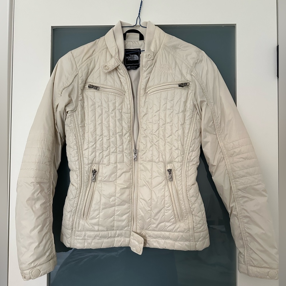 The North Face cream puffer jacket